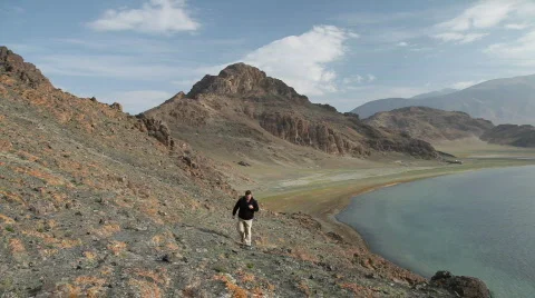 Mountain Hiking in Mongolian Altai at Tolbo Nuur lake Stock Footage