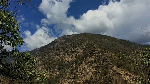 Mountain hill peak and sky clouds. Nature landscape HD video background. Stock Footage 64827323