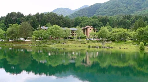 Mountain hotel on the lake side. Stock Footage 7740803