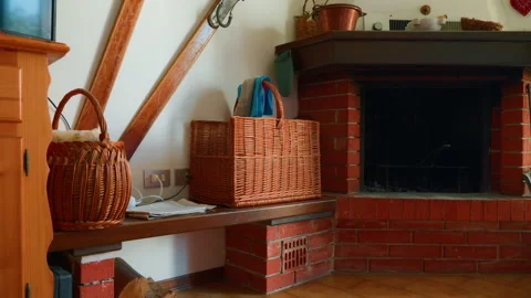 Mountain House Fireplace Corner with Wicker Baskets and Brick Chimney Stock Footage 320209016