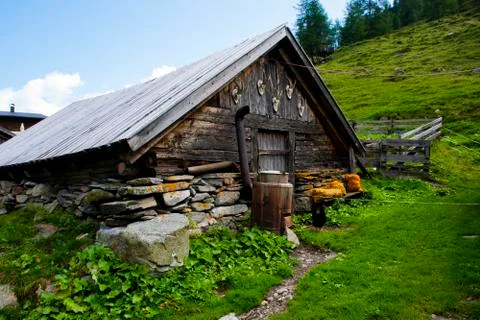 Mountain hut and clouds four Stock Photos