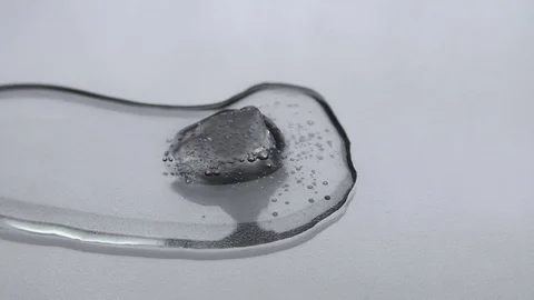 Mountain of ice rises from the liquid Stock Footage 81791156