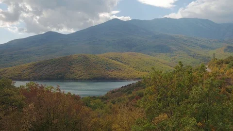 Mountain lake in autumn cloudy day Stock Footage 81087828