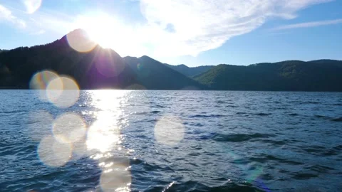 Mountain lake with big waves caused by wind. Slow motion Stock Footage 161801387