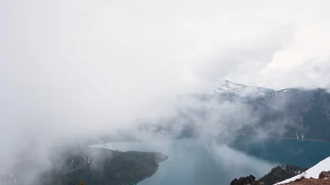 Mountain lake clouds ridge panorama whistler bc canada cloudy time lapse for Stockbeeldmateriaal 277669176
