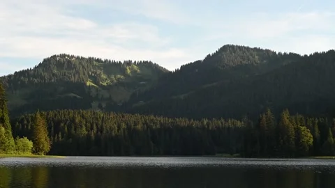 A mountain lake in the evening Video stock 217379992
