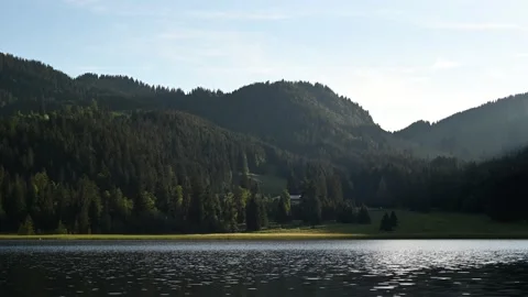 A mountain lake in the evening Video stock 217380062