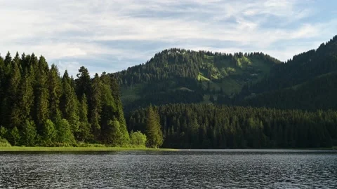 A mountain lake in the evening Video stock 217380153