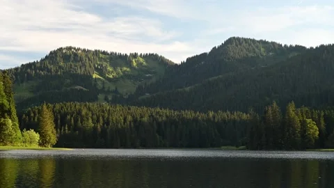 A mountain lake in the evening 스톡 동영상 217380297