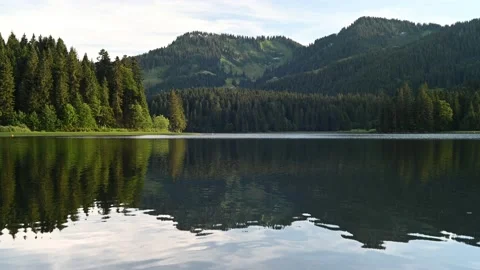 A mountain lake in the evening 스톡 동영상 217380421