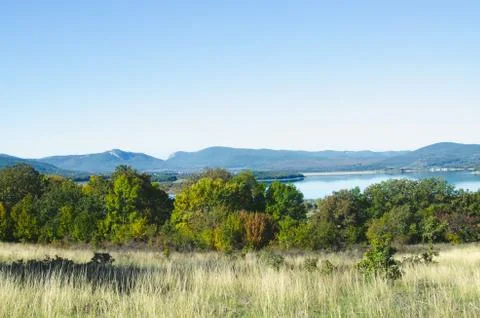 Mountain lake in the forest Stock Photos