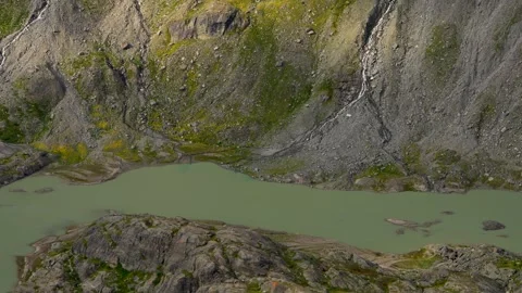 Mountain Lake on  Grossglockner Glacier,  highest mountain in Austria. Stock Footage 283550191