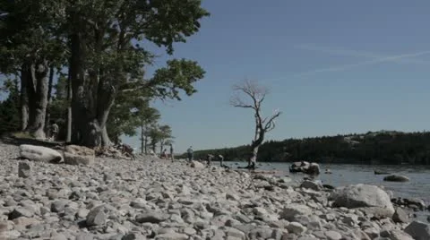 Mountain Lake with People in Background Stock Footage 22018527