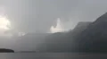 Mountain lake rain clouds timelapse Austria alps HD Footage