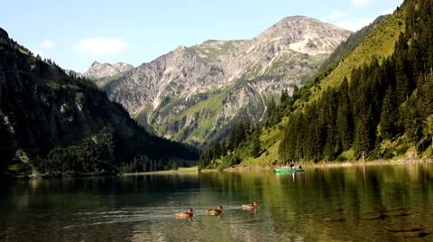 Mountain lake rowers Stock Footage 8908785