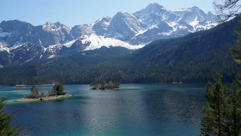 Mountain lake with scenic mountain range in the background. Zugspitze Eibsee Stock Footage 88796214