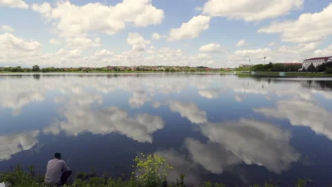 Mountain lake sky is reflected clouds Stock Footage 231026498