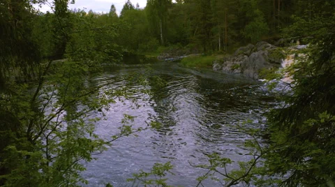 Mountain lake with small falls Video stock 51509260