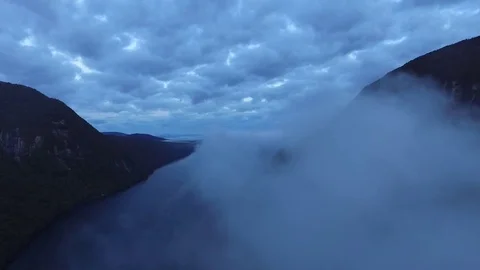 MOUNTAIN LAKE SUNRISE WITH FOG AND SUN Stock Footage