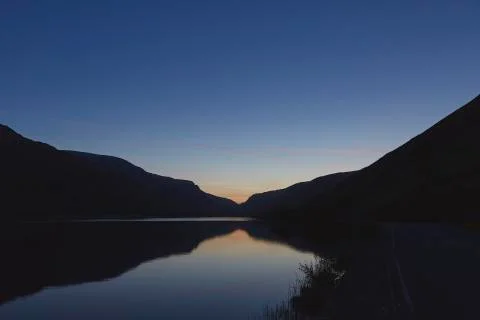 A mountain lake at sunrise Stock Photos