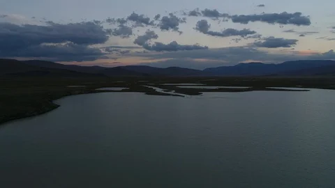 Mountain lake at sunset,  4k Stock Footage 108028843