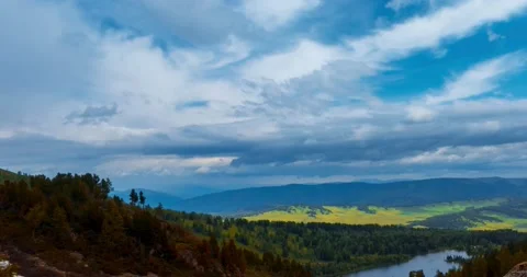 Mountain lake time-lapse at the summer or autumn time. Wild nature and rural Stock Footage 169658711