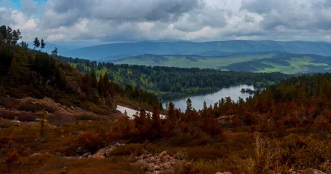 Mountain lake time-lapse at the summer or autumn time. Wild nature and rural Stock Footage 169659744
