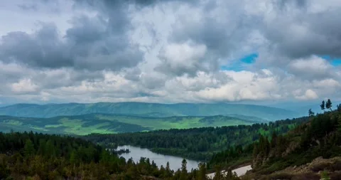 Mountain lake time-lapse at the summer or autumn time. Wild nature and rural Stock Footage 283461981