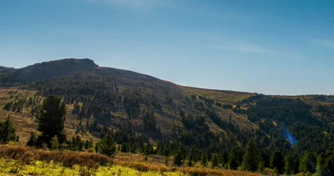 Mountain lake time lapse in summer or autumn. Wild nature and beautiful sunset Stock Footage 293580317