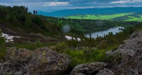 Mountain lake time-lapse at the summer or autumn time. Wild nature and rural Stock Footage 307380823