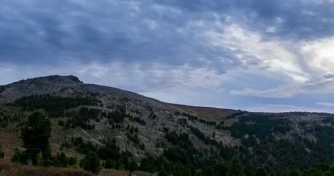 Mountain lake time lapse in summer or autumn. Wild nature and beautiful sunset Stock Footage 310290689