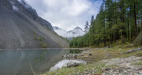 Mountain lake timelapse at the summer or autumn time. Wild nature and rural Stock Footage 128732287