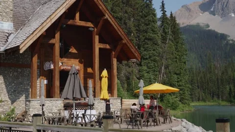 Mountain Lakeside Cafe with Rustic Wooden Architecture Stock Footage 255626366
