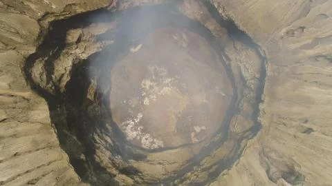 Mountain landscape with an active volcano 스톡 사진