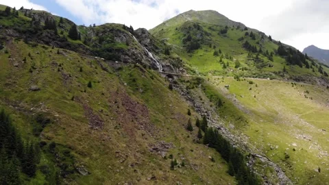 Mountain landscape and Capra waterfall in Romania Stock Footage 194475584