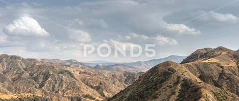 Mountain landscape and sky in Armenia wide screen Stock Photos