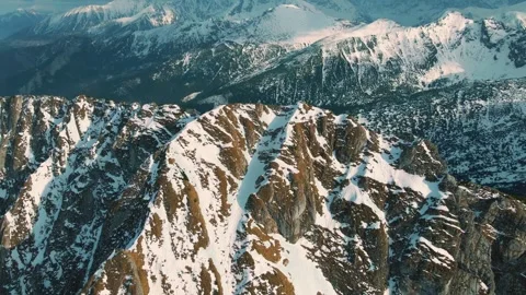 Mountain landscape and vast valleys. Cloudscape over snow-capped cliffs. Alas Stock Footage 331402977
