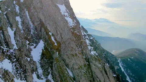 Mountain landscape and vast valleys. Cloudscape over snow-capped cliffs. Alas Stock Footage 331402980