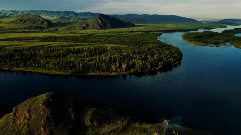 Mountain landscape on the background of a blue river Stock Footage 148837780