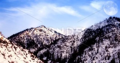 Mountain landscape with big moon in the sky Stock Photos