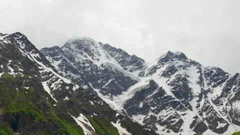 Mountain landscape with blue sky and floating clouds on a sunny day Stock Footage 342713864