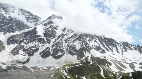 Mountain landscape with blue sky and floating clouds on a sunny day Stock Footage 342713957