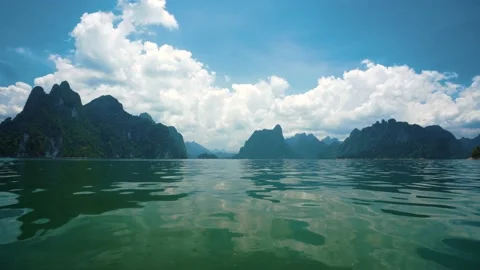 Mountain Landscape on boat floating in Ratchaprapha Dam National Park Stock Footage 154016890