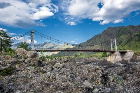 Mountain landscape with a bridge over the Katun river. Altai Republic Stock Photos