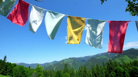 Mountain landscape with Buddhist praying flags fluttering in the wind Stock Footage 51124365