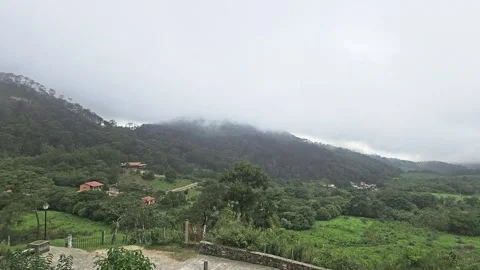 Mountain Landscape with Clouds and Cabins Stock Footage 317350867