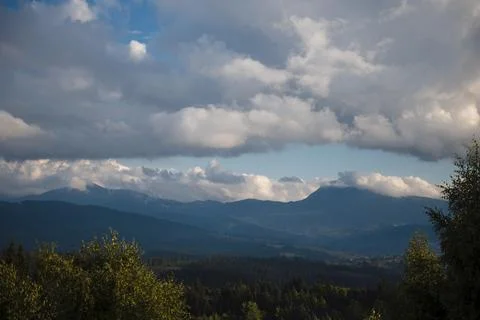 Mountain Landscape with Clouds and Greenery Stock Photos