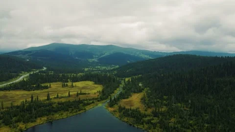 Mountain landscape with clouds and lake. Stock Footage 148651560