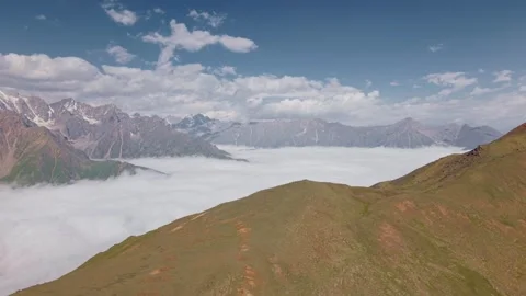 Mountain landscape with clouds and peaks, showcasing parallax movement across Stock Footage 341355981