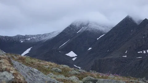 Mountain landscape. Clouds flowing through the mountains 動画素材 93953319
